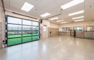Our open daycare room with a glass-door garage to the outside play area.
